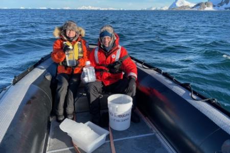 Image: Patricia Medeiros and Renato Castelao aboard a Zodiac boat collecting samples.